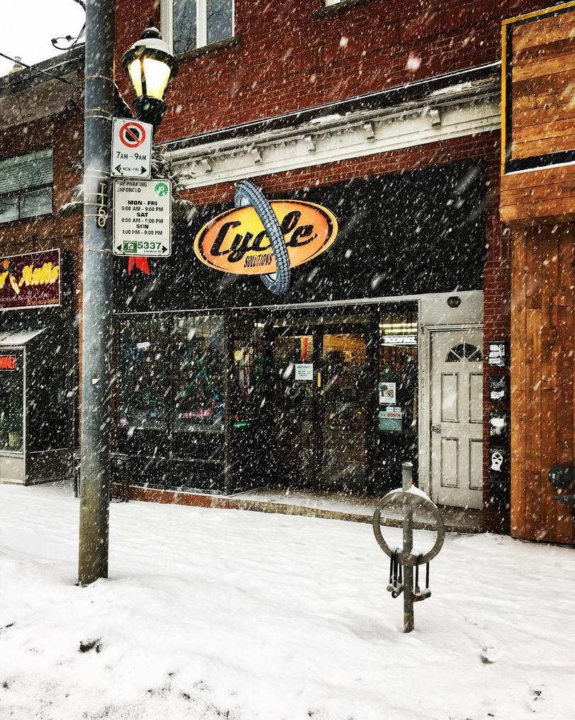 The Cycle Solutions shopfront on a snowy winter day